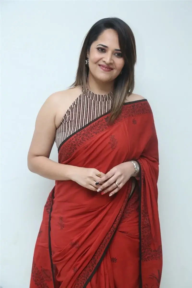 Hyderabad Girl Anasuya Bharadwaj in Red Saree at Movie Press Meet